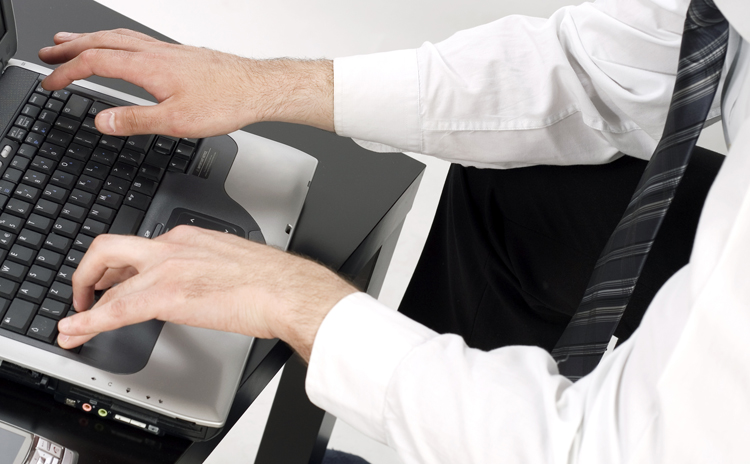 Business guy at computer
